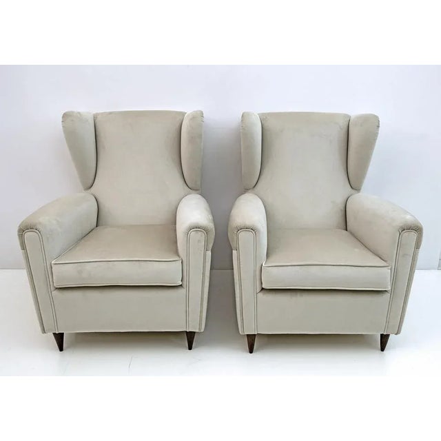 Elegant and splendid pair of Mid-Century Modern armchairs, attributed to Gio Ponti, 1950 for Edizioni Isa, Bergamo. The...