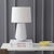 Illuminate your space with the elegant Stark table lamp. Standing at 18 inches, this white ceramic lamp brings...