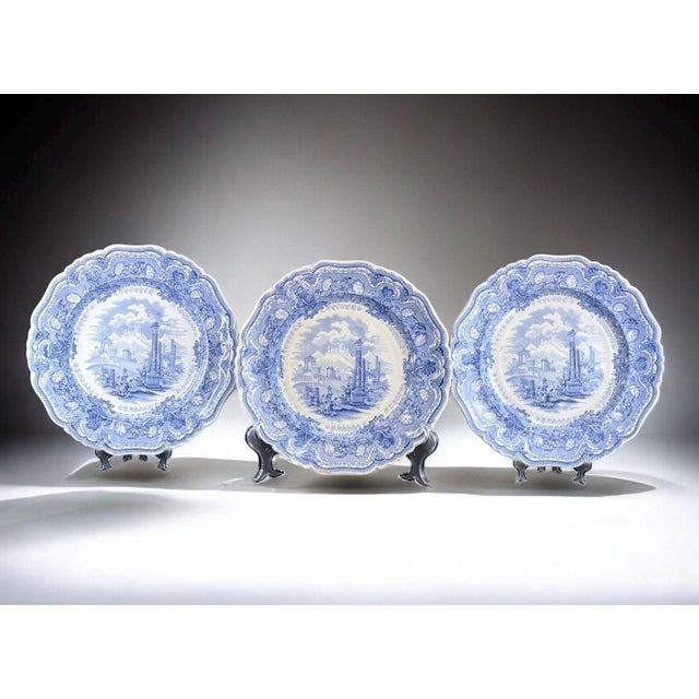 Beautiful set of three antique blue transferware plates in the “Acropolis” pattern, crafted in England around 1835–1860....
