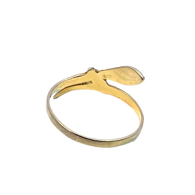 Embrace your bold side with our exquisite 14k Yellow Gold Snake Ring, a stunning piece that effortlessly combines elegance...