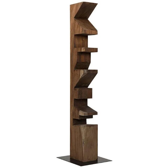 A contemporary totem for modern urbanite, this impressive sculpture has been hand-hewn from teak and given a soft, natural...