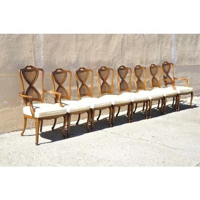 Vintage French Provincial Hollywood Regency Cane Back Pretzel Twist Dining Chairs - Set of 8. Listing includes (2)...