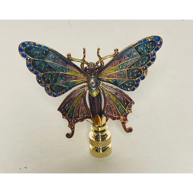 Beautiful polychrome enamel brass butterfly figurine mounted on brass base as lamp finial.