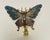 Beautiful polychrome enamel brass butterfly figurine mounted on brass base as lamp finial.
