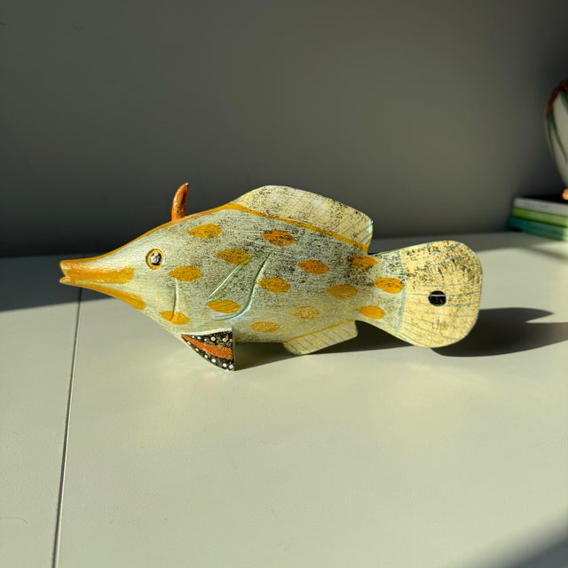 Vintage Hand Painted Wood Triggerfish Decoy in robins egg blue, orange, yellow, and brushed gold. It reflects wonderfully...