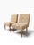 OVERVIEW A pair of mid-century slipper chairs made in Hungary in the 1970s, with their original factory label still under...