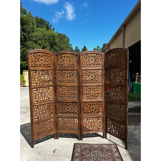 Up for consideration is a beautiful vintage large hand carved wooden screen/room divider. This would look lovely in your...