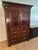 An exceptionally handsome Polo Ralph Lauren armoire showcasing the timeless sophistication, architectural presence, and...