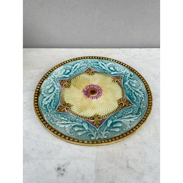 Lovely colorful French Majolica plate with flowers and acanthus leaves Orchies, circa 1890.