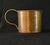 Offered here is a charming antique copper rum cup, reminiscent of the traditional measuring mugs used aboard British naval...