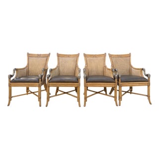 Set of 4 Asian Chinoiserie Faux Bamboo Armchairs With Sculptural Metal Fish Motifs For Sale