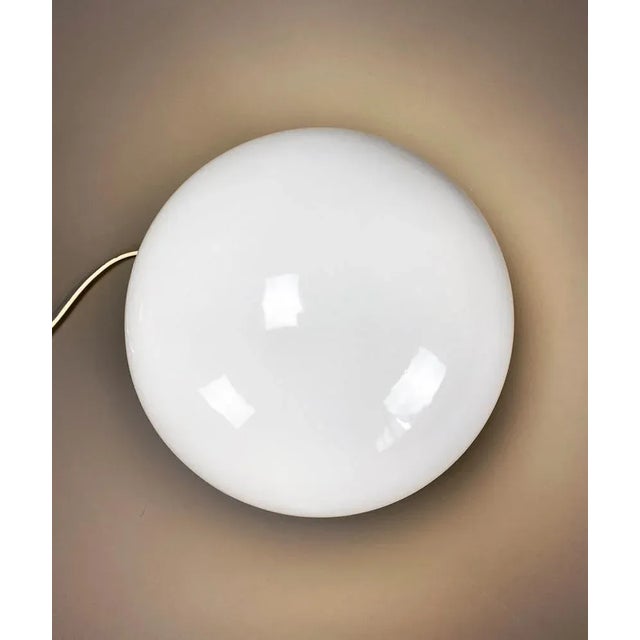 Stylish 1960's round ceramic Italian table lamp in very good condition. This elegant piece, "La Luna" the moon, was...