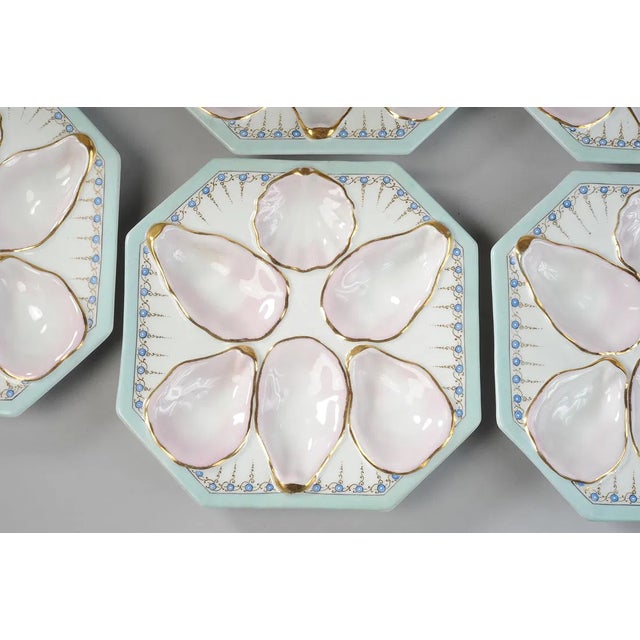 Set of 9 hand painted (pale blue and pink) porcelain oyster plates by Joseph Schachtel, Sophienau. Can also be sold as two...