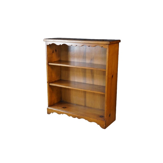 This Early American style bookcase captures the warm, utilitarian charm of traditional colonial-era craftsmanship. Built...