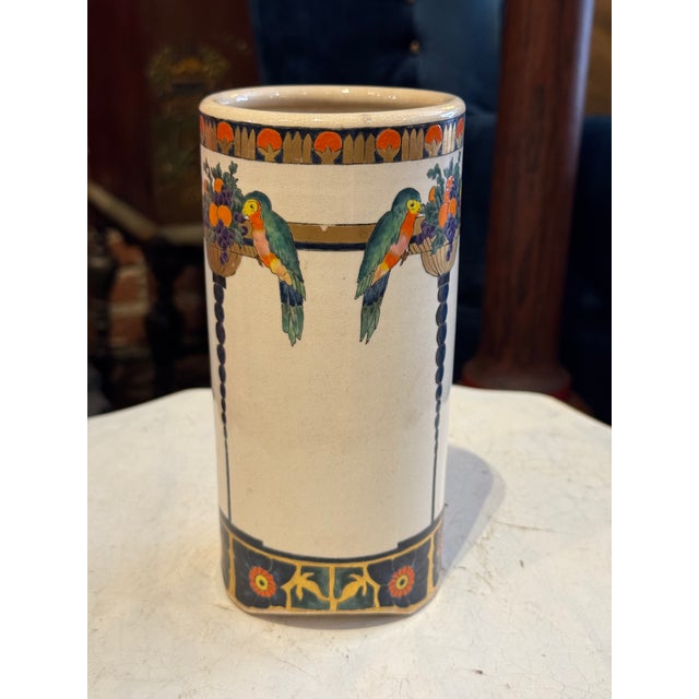 This handpainted pottery vase couldn't be more Art Nouveau! The colors are fantastic, the motif is typical of that era......