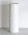 Tall bisque porcelain floor vase with a softly cylindrical form and richly textured vertical relief. The matte white...