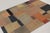 Handwoven in cotton and wool, this 5x7 vintage Turkish patchwork rug, dating to circa 1950–1960, captures the essence of...