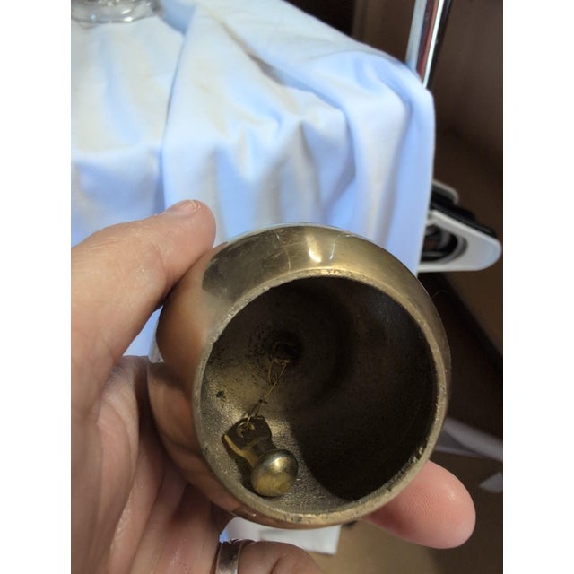 Vintage brass apple-shaped paperweight featuring a detailed leaf stem. • Solid brass construction with a smooth finish •...