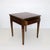 A fine Neoclassical-style square table. The highly figured mahogany timber is enhanced with patinated brass inlay. There...