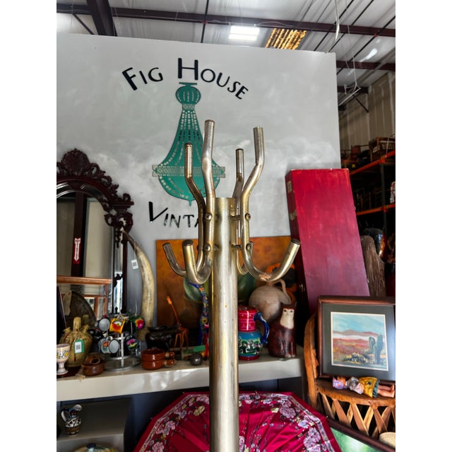 Up for consideration is a beautiful vintage simple brass coat rack. This would look lovely in your home, and it is a great...