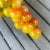Large Italian vintage hand painted alabaster grape cluster. In fab variegated autumn colors in orange, gold, and green....