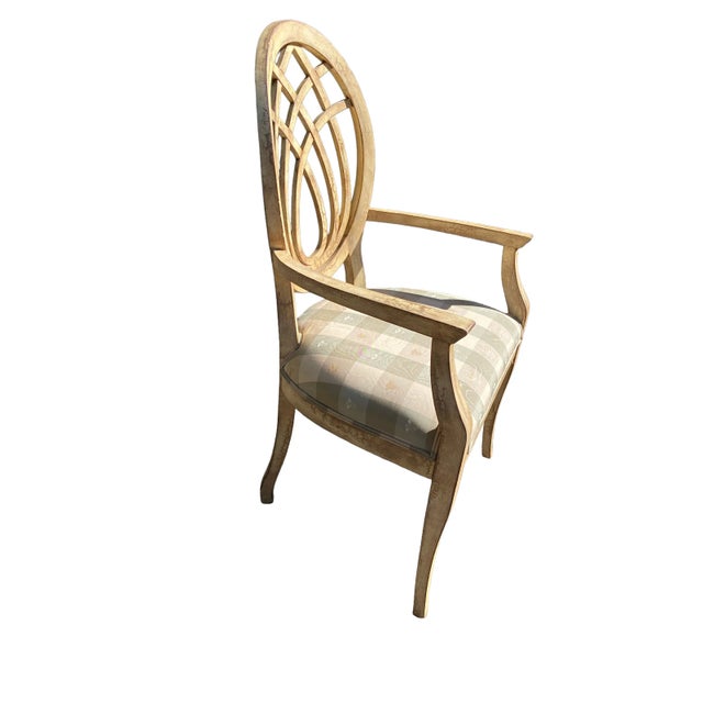Traditional chair features elegant curves, upholstered seat in tan and check pattern with bee details. Condition...