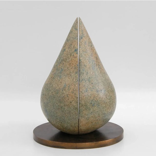 Bronze on a brass base Unique Stamped with monogram signature and uniquely numbered 342 The two main elements have a small...