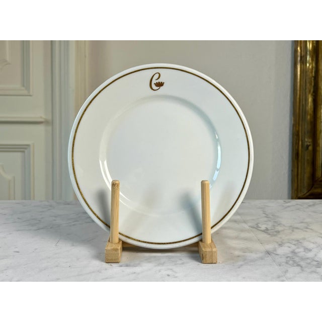 An elegant vintage porcelain plate made for the Hôtel de Crillon in Paris, one of France's most historic luxury hotels....