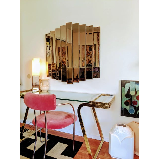 This is an absolutely stunning amber smoked waterfall mirror from Windsor Art in 1989. Pulled out of my grandmas house and...