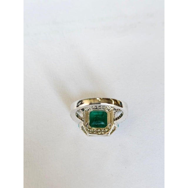 A very gorgeous and beautiful, modern style, Emerald & Turquoise Engagement Ring set in 18K White Gold & natural Diamonds....