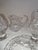 Nice collection of two Decanter and stopper bottles(7"h 4"w 2"d). A standing salt and pepper (4"h2.25"w 1.5"d)oval base...