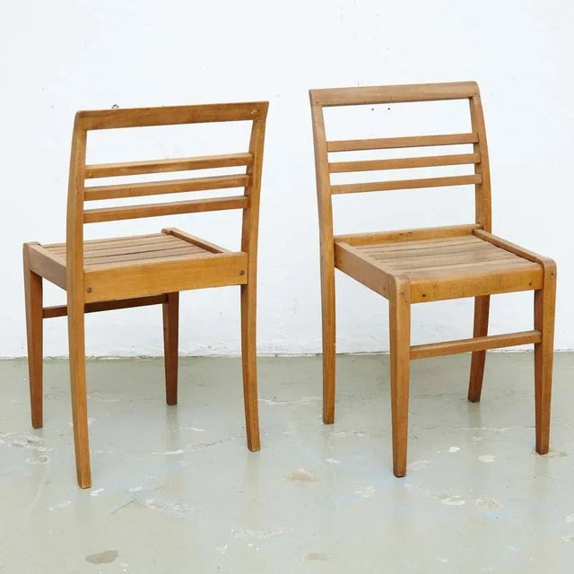 Chairs designed by Rene Gabriel, circa 1946. Manufactured in France, circa 1946. Oak wood base and structure. In good...