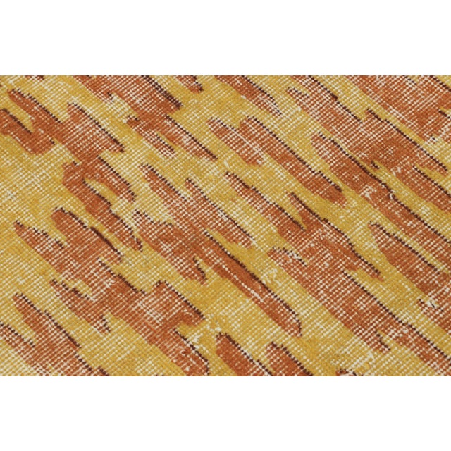 Made with hand-knotted wool circa 1950-1960, this 4x7 vintage Turkish rug of all over abstract design is an exciting new...