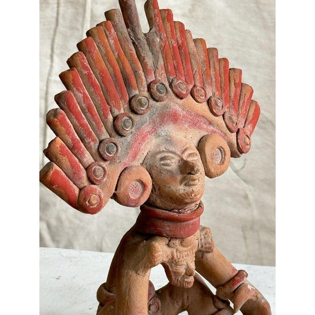 This vintage Mexican folk art clay terracotta pottery draws inspiration from the artistic traditions of ancient...
