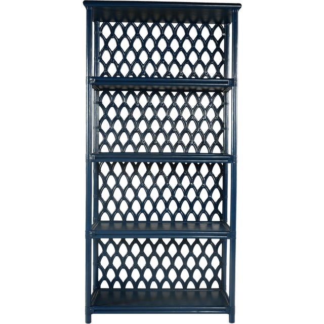 Classically styled, this étagère features a rattan frame with four wood shelves. Each joint is hand-wrapped with rawhide...