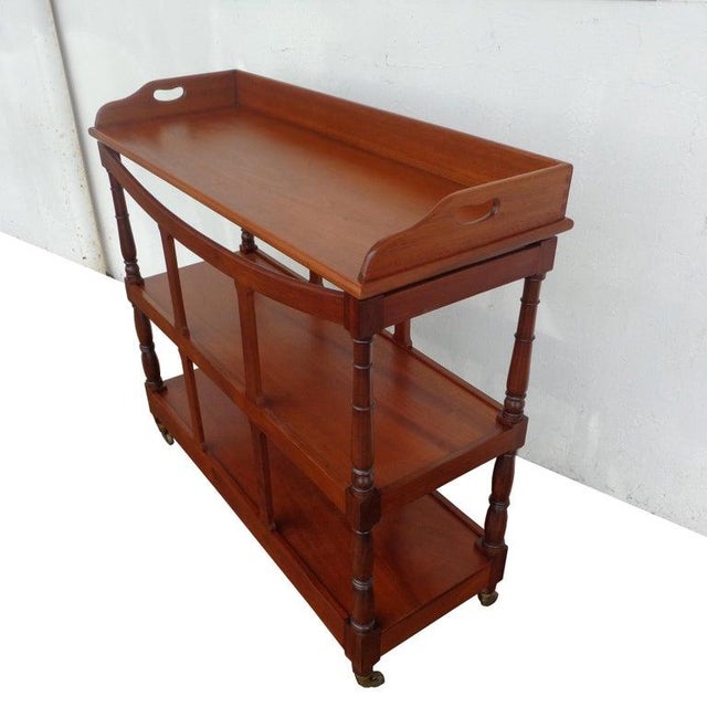 19th century Trolley Tea Cart Sometimes referred to as a "Dumbwaiter" this 3 tier piece has turned column supports and...