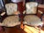 Pair of gorgeous upholstered French Louis XV arm chairs, solid wood, wonderful gold patterned urns, accompanied by...