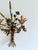 Italian two-light floral wall sconce, circa 1940s, crafted from hand-formed and hand-painted metal. Designed as a tied...