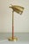 Circa 1950s Brass and Leather table lamp model E1247 by ASEA Belysning, Sweden. Decorative brass perforated lampshade with...