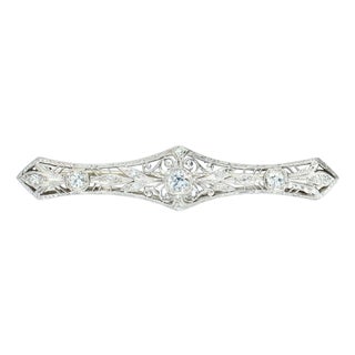 Mid 20th Century Elongated Platinum Brooch With 3 Diamonds and Filigree Design For Sale