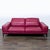 This stylish 3-seat sofa features luxurious red leather upholstery and supportive padded backrests. Its wide armrests and...