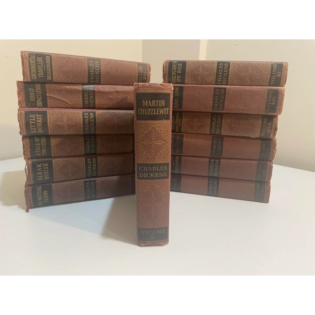 Offering an antique set of 13 Charles Dickens books. The collection features beautiful illustrations and timeless stories....