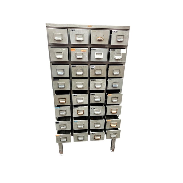 Metal library file storage cabinets on stand. Great storage cabinet for many types of items. 32 drawers- inside drawer...