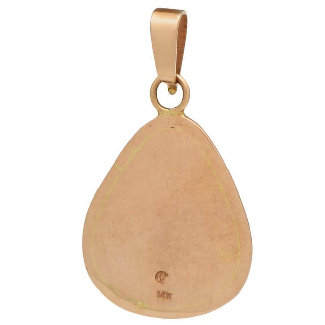 This pendant offers sophistication and elegance that would complement any wardrobe paired with it. Dazzling with...
