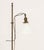 Arts and Crafts Style Bronzed Wrought Iron Floor Lamp, with milk glass shade on tripod base. 55" H x 19" W x 13" D....