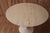 Knoll Tulip Table by Eero Saarinen. 107 cm round Calacatta marble top. Cast iron base with Rilsan coating. Stamped under...