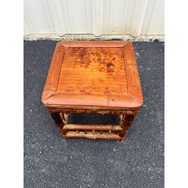 Mid 20th century burnt bamboo planter stand. Each part of this planter stand was hand crafted using traditional dry fitted...