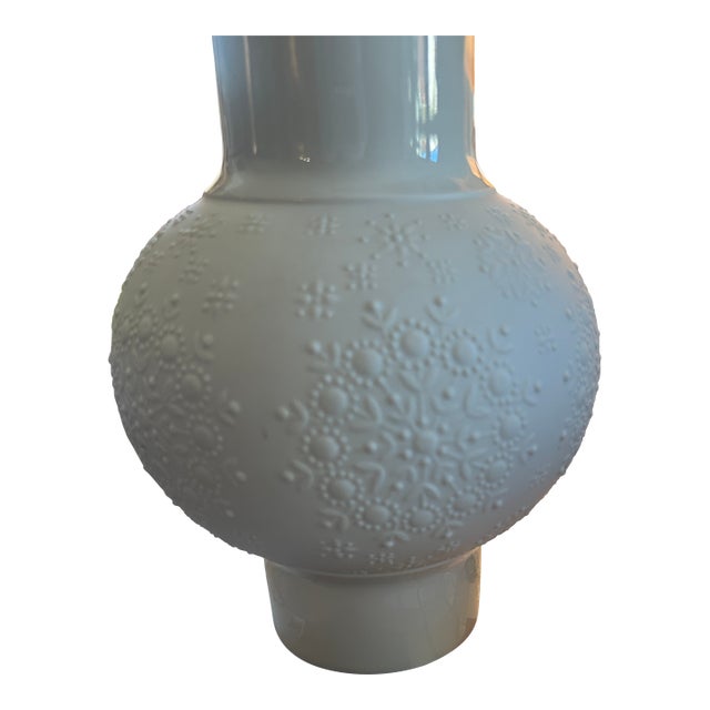 Gorgeous white porcelain vase by Heinrich & Co. (H&C) of Selb, Bavaria, featuring an allover raised floral and snowflake...