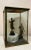 Extraordinary 19th Century metal and glass display case. The sturdy metal frame was painted at some point, giving this...