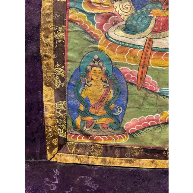 Antique 19th Century Tibetan Manjushri Thangka – Bodhisattva of Wisdom in Custom Silver Gilt Frame For Sale - Image 12 of 18